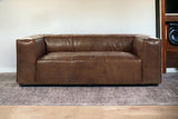 98" Brown Top Grain Leather And Black Sofa